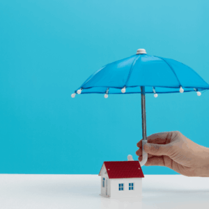 Umbrella protecting a house, symbolizing homestead equity protection for Medicaid planning